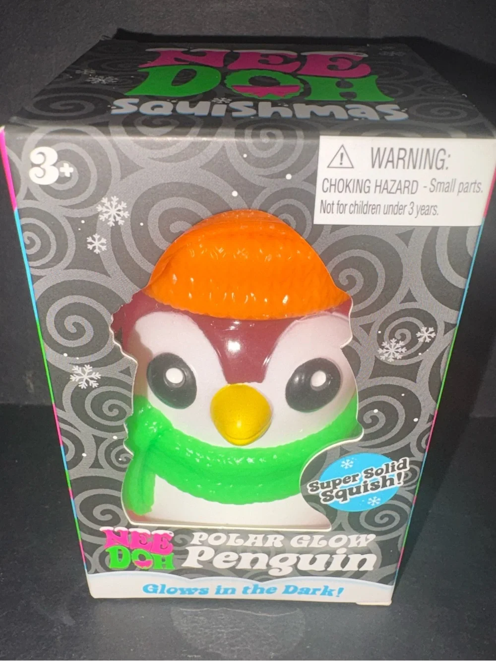 NeeDoh Polar Glow Penguin pink - orange Hat & green Scarf